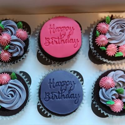 Decorated with buttercream piping and two Happy birthday discs. These cakes can  come in a number of flavours including vanilla, chocolate, red velvet and lemon (your choice, although minimum six cakes per flavour). colour scheme can always be changed to suit your preference. 