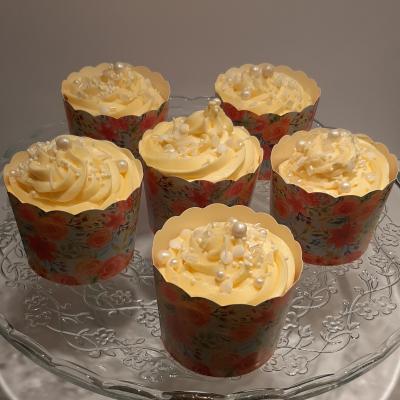 Decorated with lemon flavoured buttercream and pretty sprinkles.